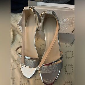 Silver  chunky heeled buckle candles size 9